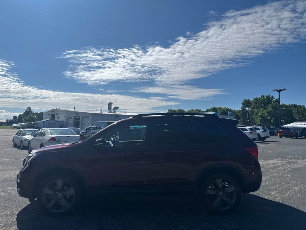 Used 2021 Honda Passport Touring with VIN 5FNYF8H90MB022977 for sale in Hutchinson, Minnesota