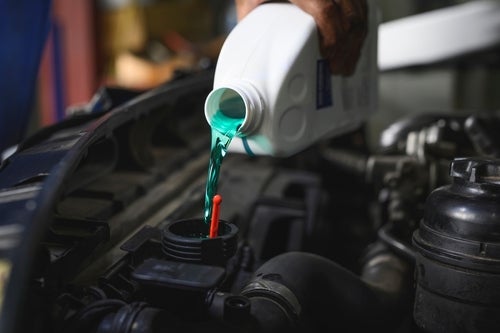 engine coolent fluid being poured